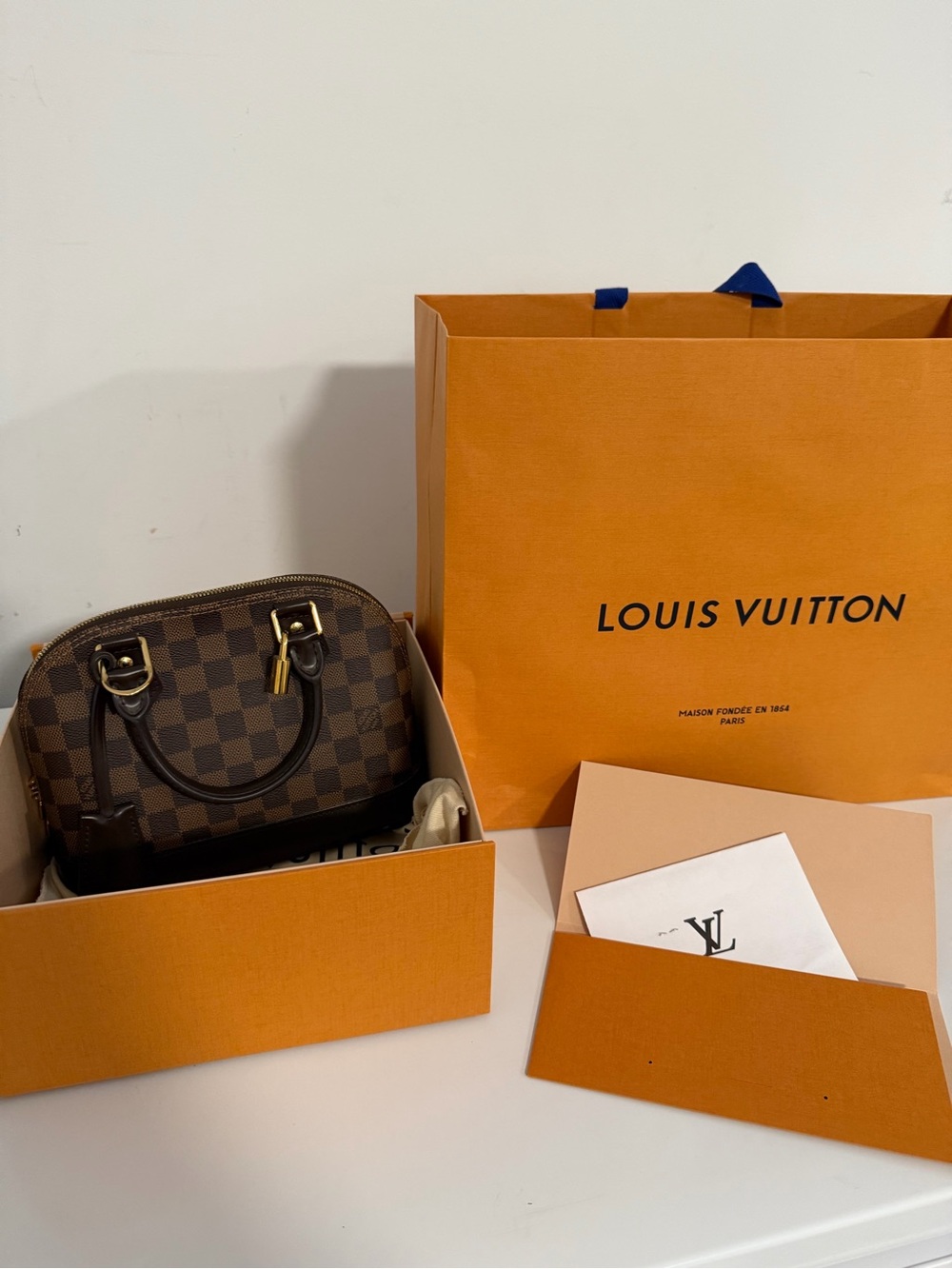 Louis Vuitton Damier Ebene Alma BB Satchel - Dark Brown & Gold - Picture 10 of 10